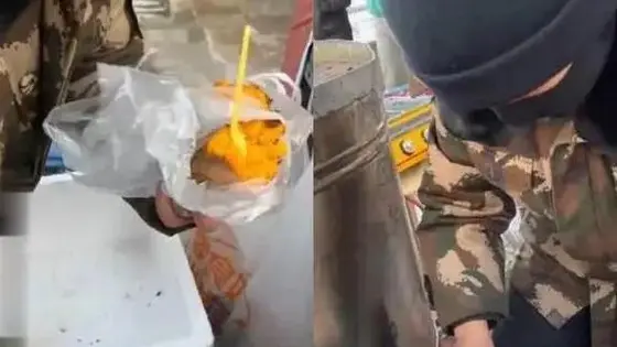 东北大哥卖烤地瓜给外地游客配勺