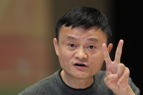 Jack Ma, executive chairman of the Alibaba Group, gestures during a press conference with the Pac-12 in Hangzhou in eastern China's Zhejiang province Tuesday, Nov. 10, 2015. On Saturday, two mens basketball teams from the University of Washington and the University of Texas will contest the first-ever regular season college basketball game in China, the first of perhaps many for U.S. university teams as they try to tap into a new market for their sports - and their schools - in the worlds second-biggest economy. (AP Photo)
